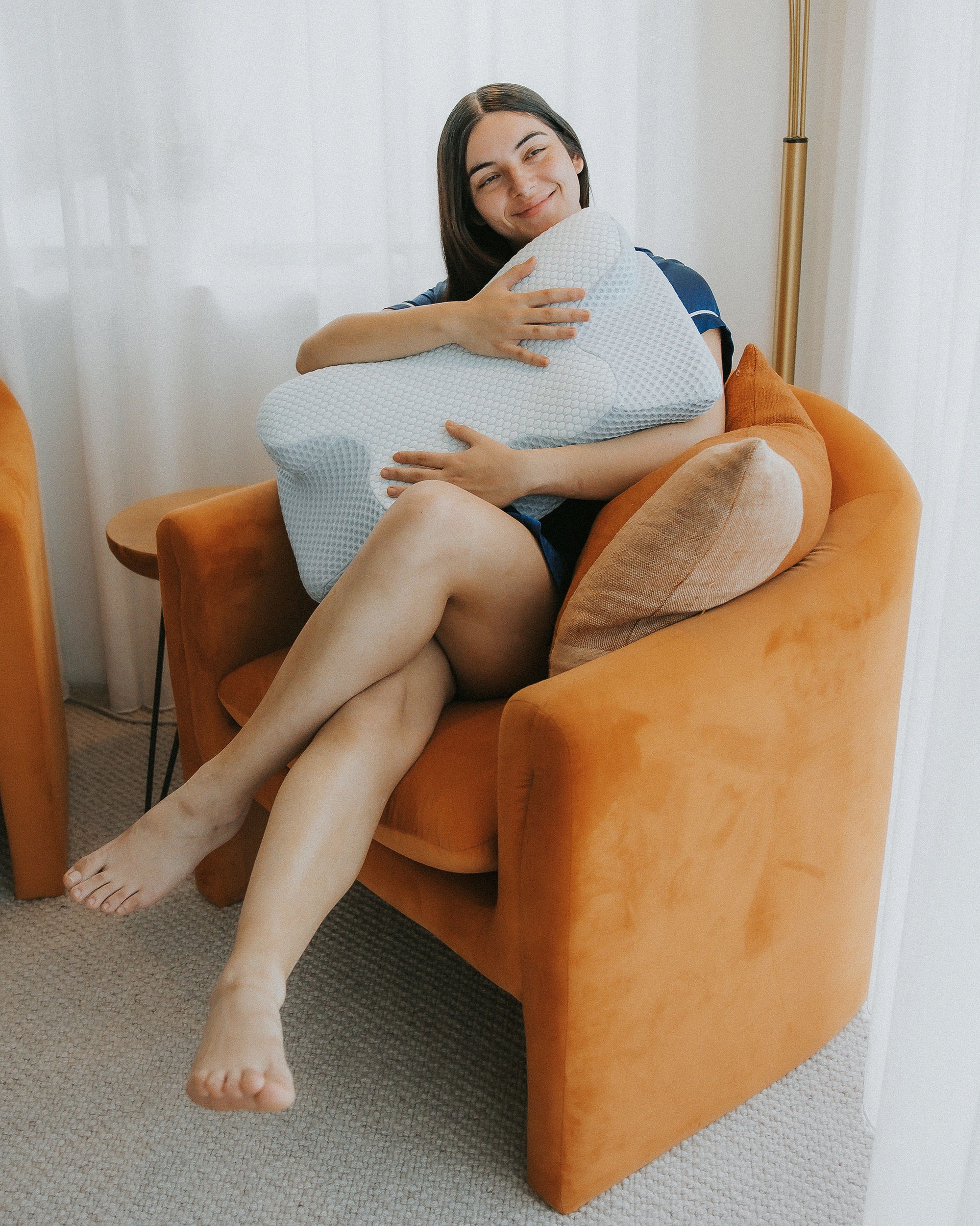 The Dream Sleep Alpine Blue high-density contour posture pillow, perfectly positioned for support. This therapeutic sleep aid is the ultimate solution for neck pain management and consistent, healthy sleep posture.