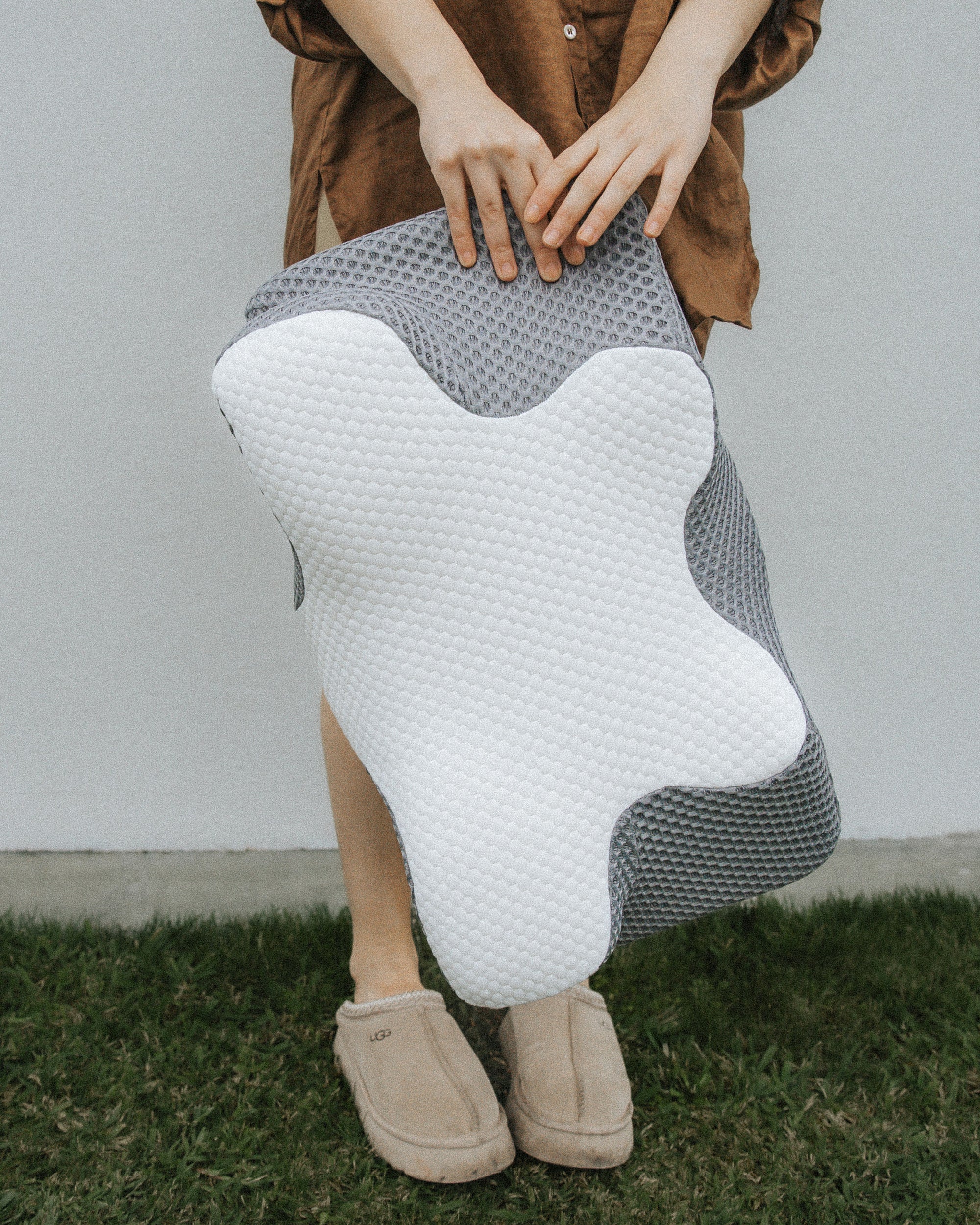 Stylish Grey/White pillowcase displayed to show the neutral colors and modern texture, complementing the Dream Sleep Posture Pillow.