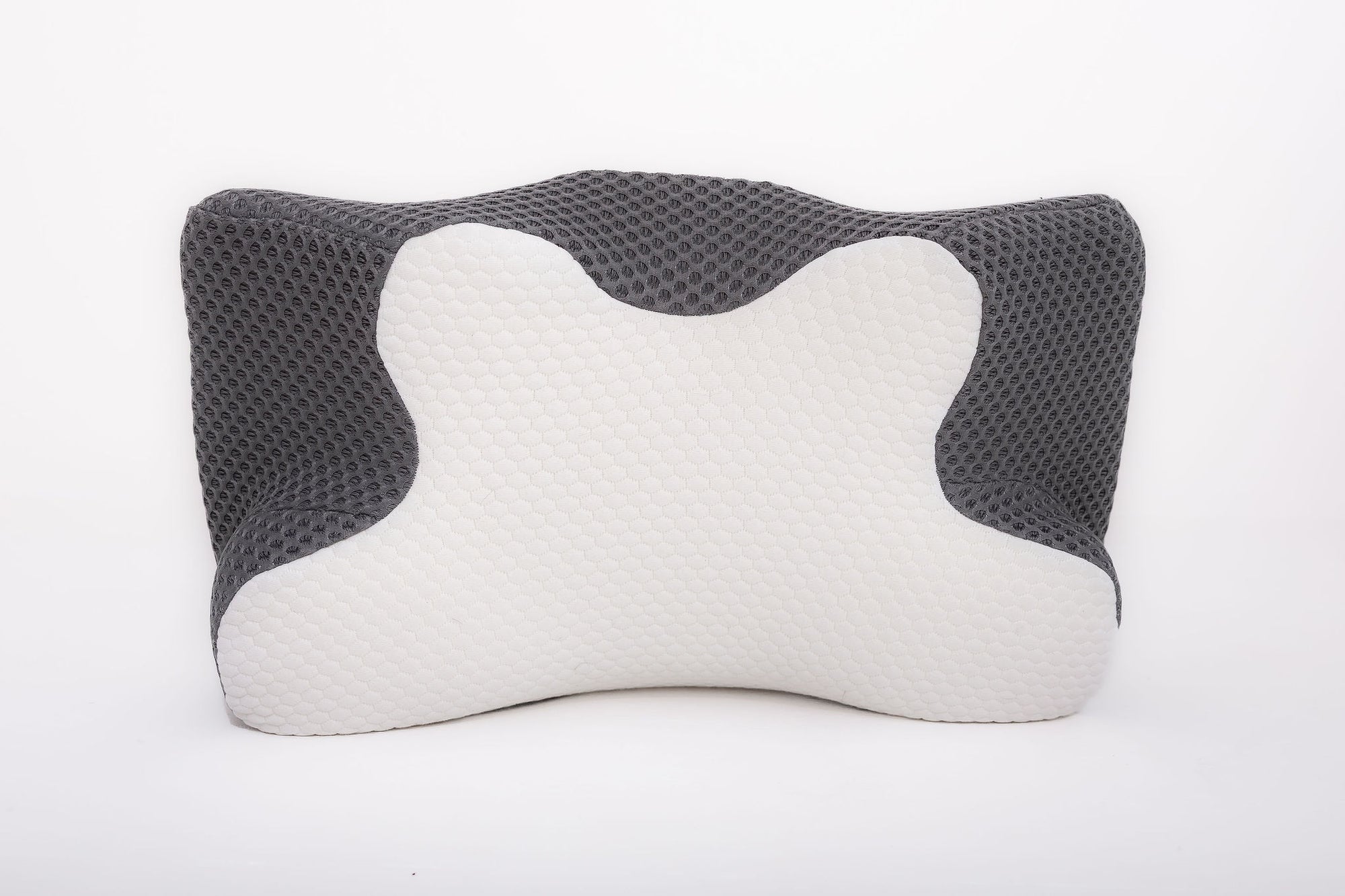 Close-up of the Grey/White pillowcase, Dream Sleep Posture Pillow, contoured memory foam design for optimal spinal alignment, providing therapeutic neck and back pain relief.