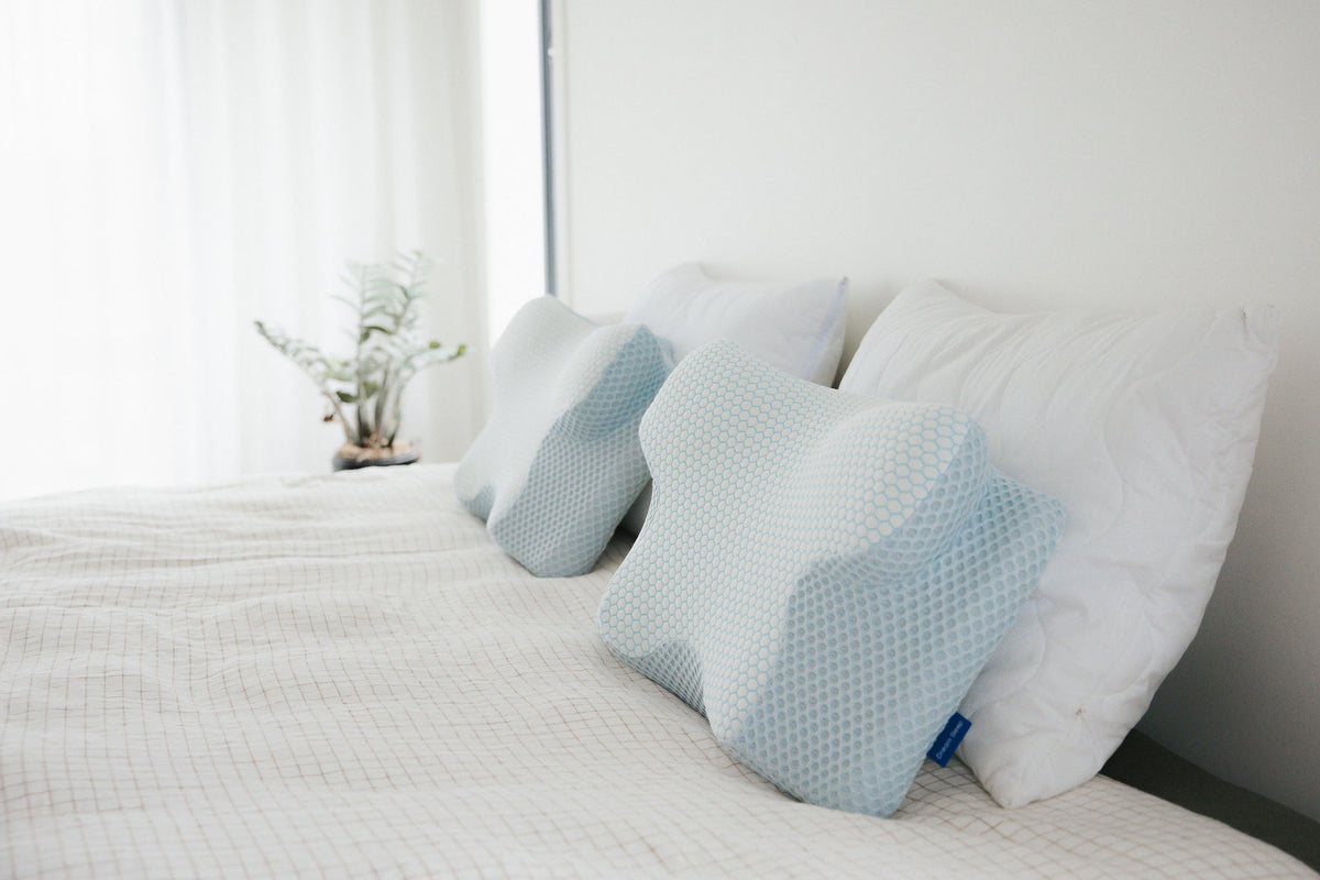 Premium orthopaedic neck pillow by Dream Sleep NZ, scientifically designed to relieve chronic neck pain and improve spinal alignment during sleep.